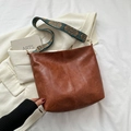 Vintage brown leather bucket bag with geometric patterned wide strap for women - Brown