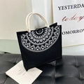 Black canvas tote bag with white tribal pattern and off-white cotton rope handles - Horizontal / Black