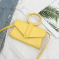Fashionable bright yellow leather envelope crossbody bag with round top handle - Yellow