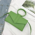 Bright green candy color envelope crossbody bag with a round top handle and shoulder strap - Green
