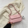Pink crossbody bag with diamond lattice pattern and cute white pompom pendant charm - Pink