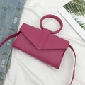 Borsa a busta magenta con grande manico rotondo e tracolla sottile coordinata - Rosa Rosso