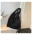 Close-up of black sequined tote bag with matching mini pouch and reflective texture - Black
