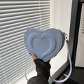 Chic light blue heart-shaped crossbody bag with multi-layer embossed leather finish - Blue