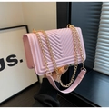 Chic pink quilted crossbody bag with V-stitch pattern and golden chain strap for women - Pink