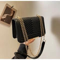 Chic black V-quilted faux leather crossbody bag with gold chain strap for women - Black