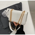 White quilted shoulder bag with chevron stitching and golden chain strap for women - Off White