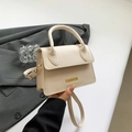 Sac à main en cuir texturé blanc crème avec texte FASHION doré et poignée - Blanc