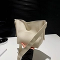 Chic cream white bucket bag in lychee pattern leather with a wide shoulder strap - White