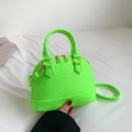 Neon green crocodile pattern shell bag with top handle and adjustable shoulder strap - Grass Green