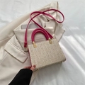 Beige woven summer handbag with vibrant fuchsia handles and matching leather strap - Rose Red