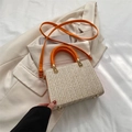 Fashionable woven beige handbag with bright orange handles and adjustable strap - Orange