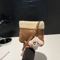 Brown suede crossbody bag with cream fleece trim and white plush dog charm detail - With Pendant / Khaki
