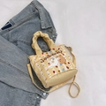 Borsa a secchiello in tela giallo zenzero con stampe di gatti su sfondo di jeans - Giallo