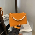 Orange square shoulder bag with white pearl chain and fashion lettering on matte leather - Orange