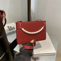Red matte leather small square bag with pearl handle and golden fashion logo - Red