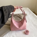 Pink patent leather hobo crescent bag with bow detail and adjustable shoulder strap - Pink