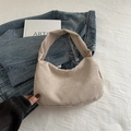 Chic beige corduroy underarm bag with soft ribbed texture for autumn casual styling - Khaki