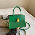 Chic emerald green crossbody bag with crocodile texture and gold buckle detail - Green