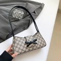 Retro-Unterarmtasche mit Kleeblatt-Muster und schwarzer Schleife in elegantem Grau - Schwarzer Klee-Stil