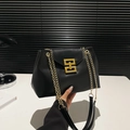 Retro black leather shoulder bag for women with gold geometric buckle and chain strap - Black