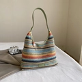 Colorful woven hobo shoulder bag with striped patterns and a green leather strap - Colorful