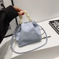 Light blue dumpling bag with matte marble bead handle and thin crossbody strap - Blue