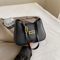 Chic black half-moon shoulder bag with premium gold buckle and matte leather texture - Black
