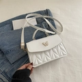 White crossbody bag with V-quilted texture and elegant butterfly pearl clasp detail - White