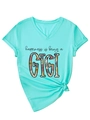 Detail of mint green V-neck T-shirt featuring floral GIGI print and stylish knotted hem - S / Deep Water Blue (Black Print)