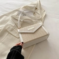 Chic beige straw woven crossbody bag with white faux leather trim and top handle - White