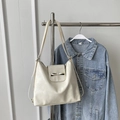 Minimalist beige leather tote bag with a small bow accent and adjustable shoulder strap - Rice White (No Pendant)