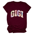 Detail of burgundy T-shirt featuring GIGI patchwork letters with floral and dot patterns - S / Burgundy