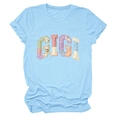 Close-up of GIGI patchwork letters on light blue cotton T-shirt with floral fabric detail - S / Light Blue