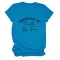Close-up of rolled sleeve detail and slogan print on blue cotton t-shirt - S / Lake Blue (Black Font)
