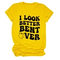 Detail of yellow cotton T-shirt featuring black artistic font and peach graphic design - Yellow (Black Letter Peach)