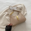 Beige crescent underarm bag with gold metal clasp and leather-chain strap in minimalist style - Khaki