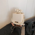 Elegant white woven square bag with pearl handle and cream drawstring closure for women - White
