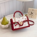 Mini crossbody bag with red cherry prints and golden clover lock in white and red - Red