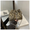 Detail of leopard print bucket bag with silver chain and pearl drawstring charms - Khaki