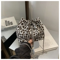 Detail of leopard print bucket bag with metal chain strap and pearl accents - White