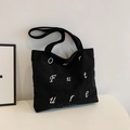 Schwarze Cord-Einkaufstasche mit Our Future Stickerei im minimalistischen Design - Schwarz