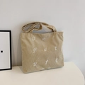 Minimalistische beige Cord-Tragetasche mit Our Future-Stickerei für den Alltag - Khaki