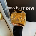 Minibolso cuadrado chic en metal dorado con estrella y correa de cadena láser - Dorado