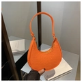 Detail of orange hobo bag featuring crocodile pattern texture and golden zipper - Orange Red