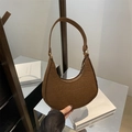 Dark brown crescent shoulder bag featuring premium crocodile texture and matte finish - Brown