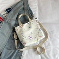 White graffiti nylon tote bag with colorful letters and detachable crossbody strap - White