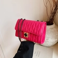 Elegant rose red crossbody bag with vertical quilting and a chic clover twist lock - Rose Pink