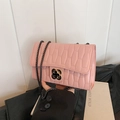 Pink quilted crossbody bag with clover buckle and gunmetal chain strap for women - Pink