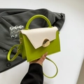 Chic green and cream leather crossbody bag with elegant gold buckle and top handle - Green and White